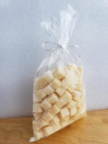 Josie's Sweet Caviar Madagascar Vanilla Sugar Cubes — clear bag tied with white ribbon
